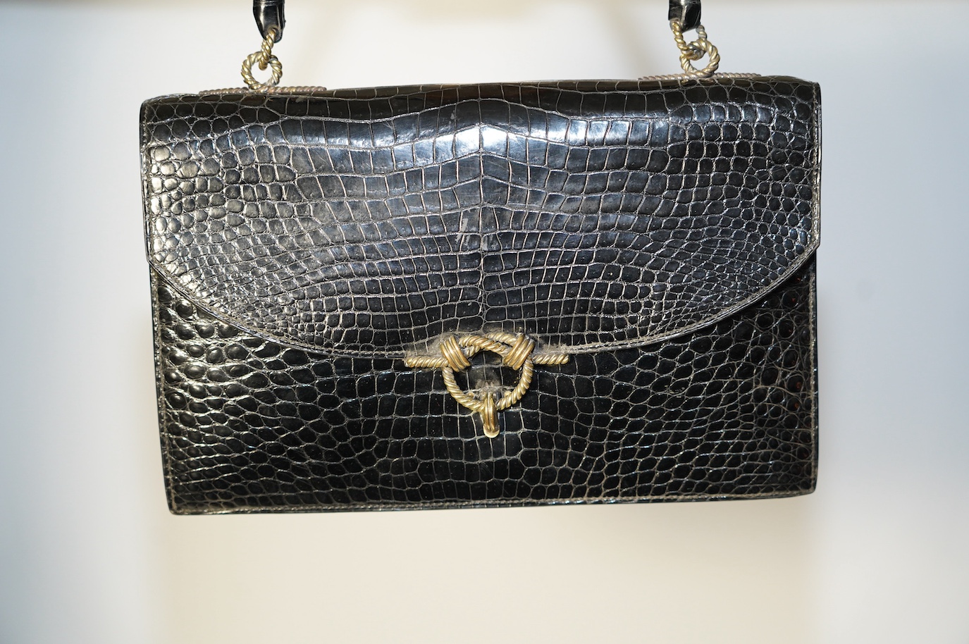 A Hermès vintage Cordeliere black crocodile handbag, height 16.5cm, top of handle 31cm, width 27.5cm, depth 5cm